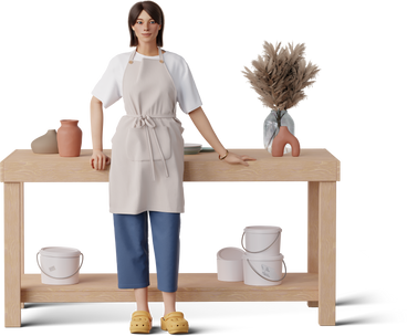 young woman in apron leaning on the table PNG, SVG
