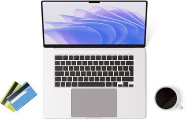 Vue de dessus d'un ordinateur portable, de cartes de crédit et d'une tasse PNG, SVG